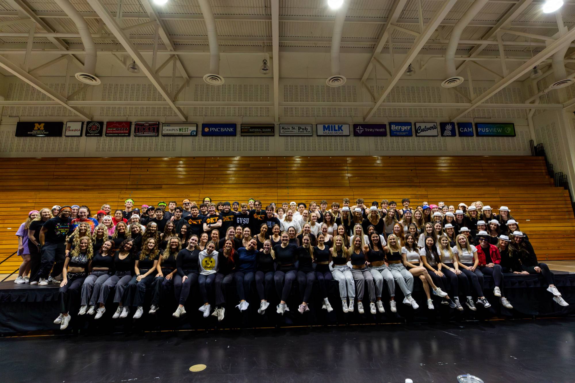 Group photo of students on stage